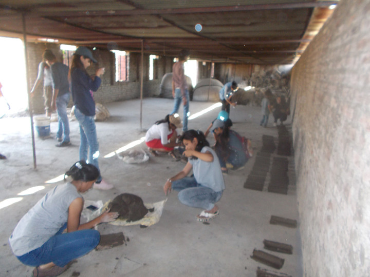 /8a-facing-mud-tiles-made-by-students-1_47255657241_c.jpg